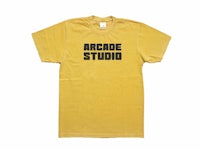 a yellow t - shirt that says arcade studio